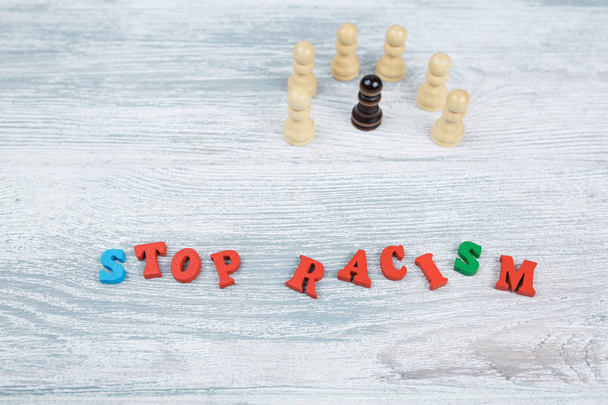 No to racism in colored letters on gray background - 写真・画像