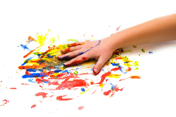 Child hand on colorful background - 写真・画像