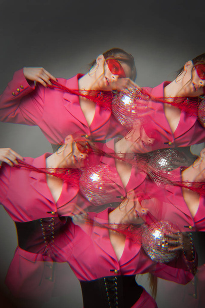 sexy woman with bright pink clothes, nets on head Conceptual color photography in kaleidoscope.. Fashion style - Foto, immagini