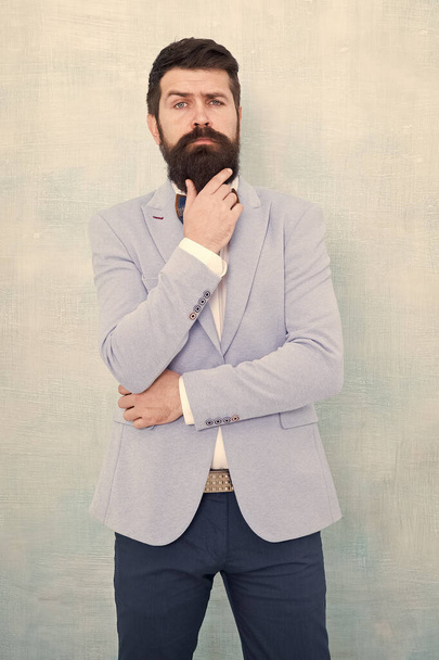 Wedding day. Stylish groom. Statement with his stunning crisp suit jacket. Stylist fashion expert. Suit style. Fashion trends for groom. Groom bearded hipster man wear light blue tuxedo and bow tie - Foto, imagen