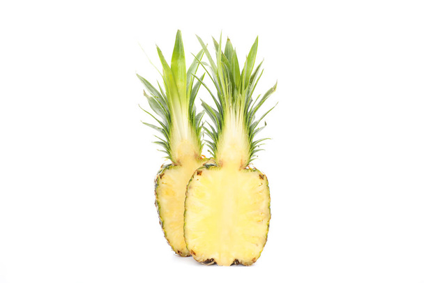 Half pineapples isolated on white background. Juicy fruit - Fotoğraf, Görsel