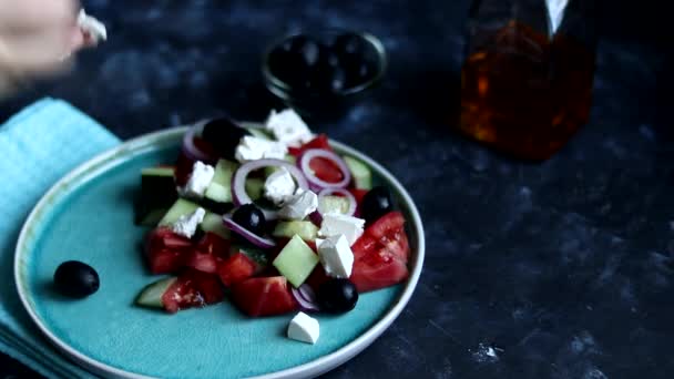 Cooking Greek Salad. On a green plate we spread tomatoes, cucumbers, sliced in slices.  - Footage, Video