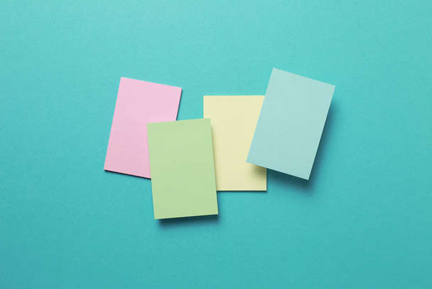 Colorful memo pad, sticky notes on mint background - Photo, Image