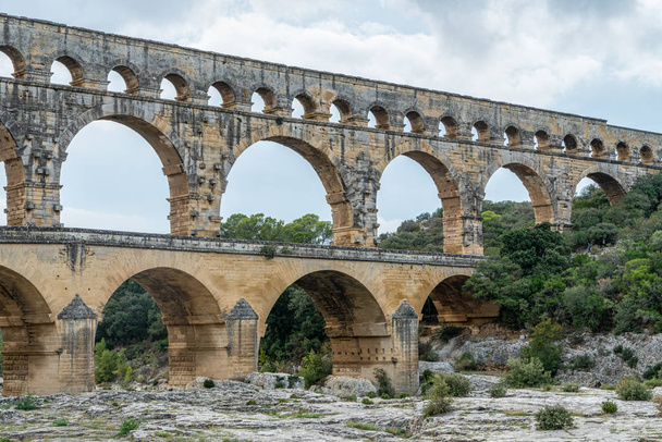 Pont du Gard is a part of Roman aqueduct in southern France - Фото, изображение