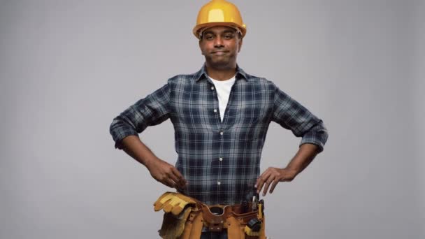 happy indian worker or builder with crossed arms - Filmati, video