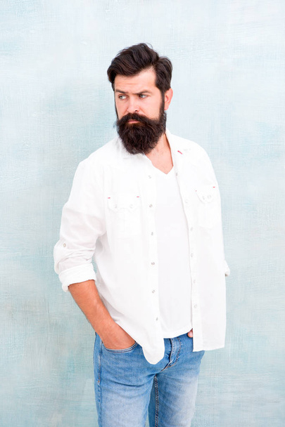 his style. Male temper brutality. bearded man radiate masculinity. handsome hipster jeans. male fashion and beauty. Masculinity concept. Summer season fashion trend. sexy brutal macho gray background - Foto, imagen