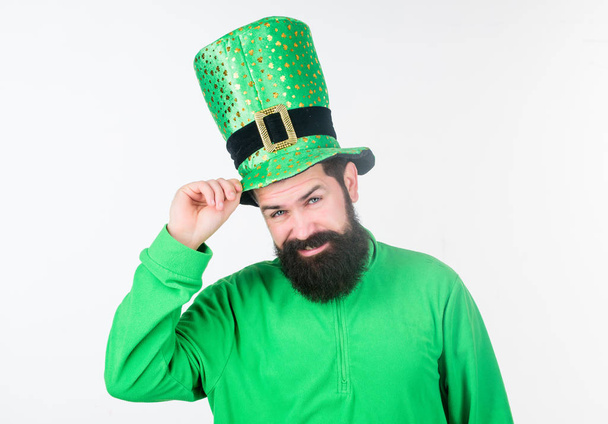 Man bearded hipster wear green clothing and hat patricks day. Saint patricks day holiday. Green color part of celebration. Myth of leprechaun. Happy patricks day. Global celebration of irish culture - 写真・画像