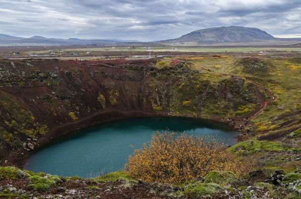 Kerid Crater Lake, formed from an inactive volcano, can be found off the Golden Circle Iceland - 写真・画像