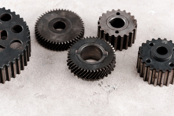 metal round gears on grey background - Foto, Bild