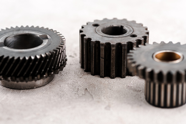 metal round gears on grey background - Foto, Imagem