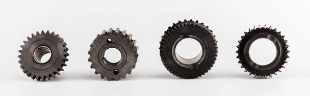 metal round gears in row on white background, panoramic shot - Photo, Image