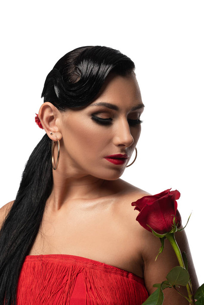 attractive, elegant tango dancer holding red rose isolated on white - Photo, image