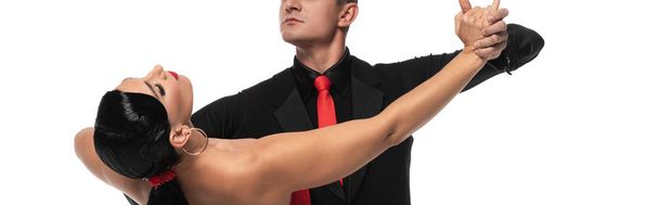 cropped view of elegant dancer performing tango with beautiful partner isolated on white, panoramic shot - Photo, image