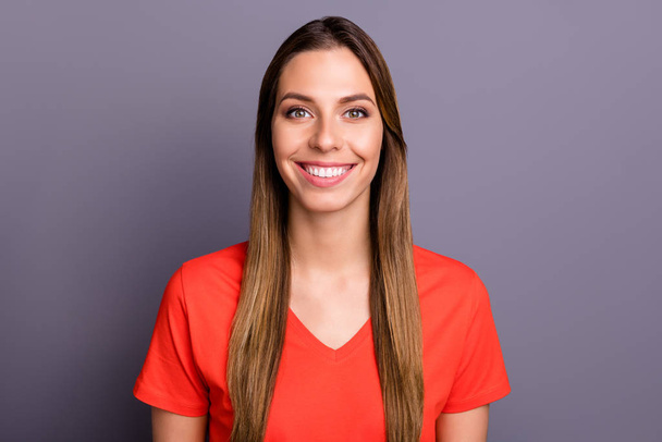 Close up photo of beautiful pretty lady toothy beaming smiling on camera good mood wear orange t-shirt isolated grey color background - Fotó, kép
