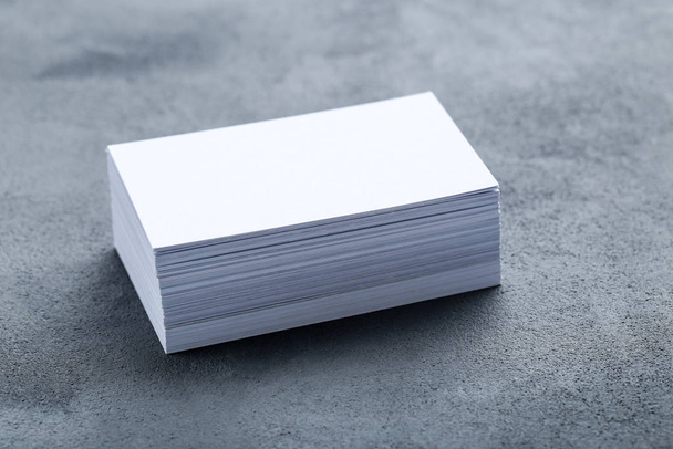 Blank business cards on grey background - 写真・画像
