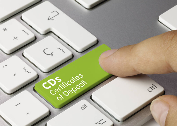 CDs Certificates of Deposit - Inscription on Green Keyboard Key. - 写真・画像