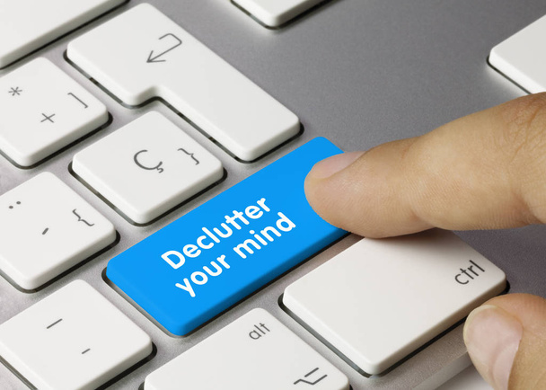 Declutter your mind - Inscription on Blue Keyboard Key. - 写真・画像