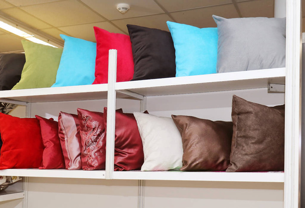 Pillows on shelf - 写真・画像
