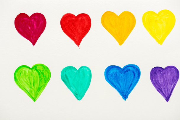 painted and colorful hearts isolated on white  - Photo, image