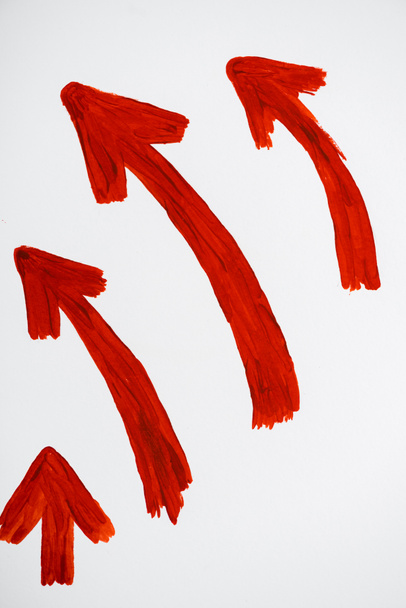 piros és rajzolt irányított nyilak jelennek meg, és balra a fehér  - Fotó, kép
