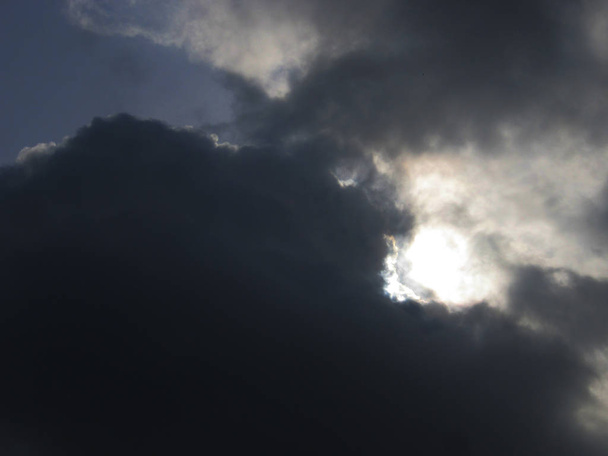 Dark Sky background with black clouds. Panorama - 写真・画像