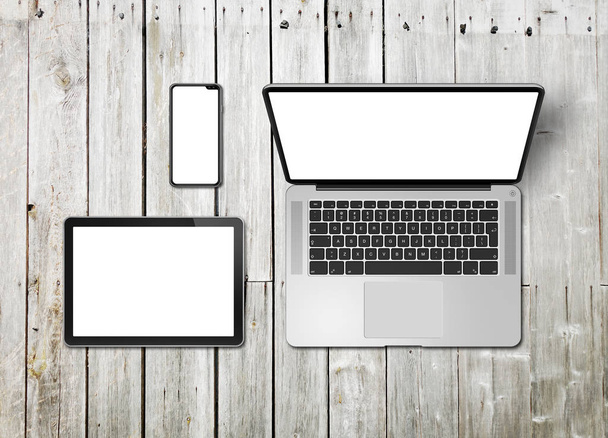 Laptop, tablet and phone set mockup on a wooden background. 3D r - Photo, image