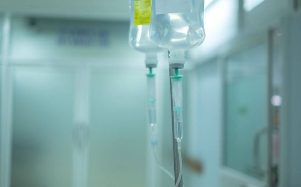 intravenous fluid bottle hanging for use to patient in hospital - Fotoğraf, Görsel