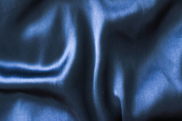 Luxury dark blue soft silk flatlay background texture, holiday g - Foto, afbeelding