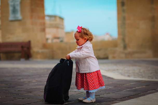 cute little girl with backpack travel in Valetta, Malta - Photo, Image