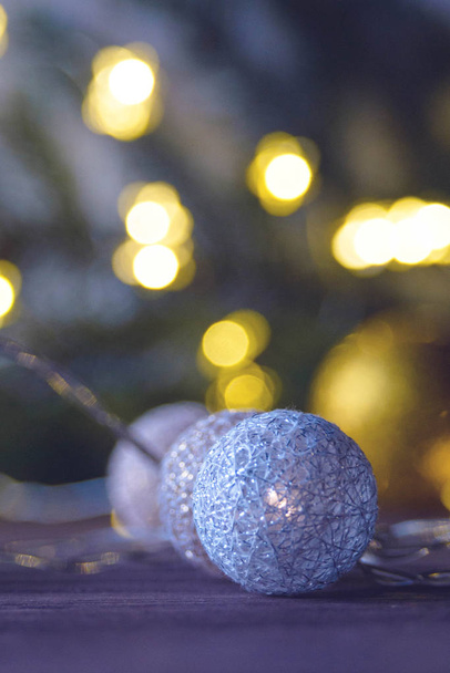 Blurred holiday background. New Year's garland. New Year and Christmas concept. Blurred. - Foto, Bild