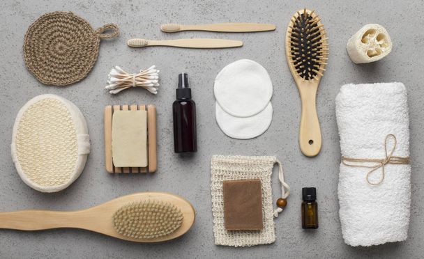 Natural eco bamboo accessories for everyday usage on gray - Fotoğraf, Görsel