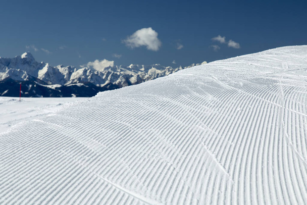 Fresh snow on ski slope, winter landscape - Foto, afbeelding