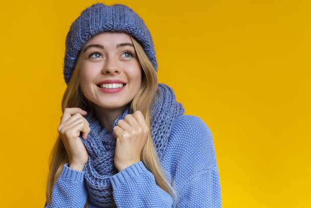 Portrait of beautiful girl in blue knitted winter set - Photo, Image