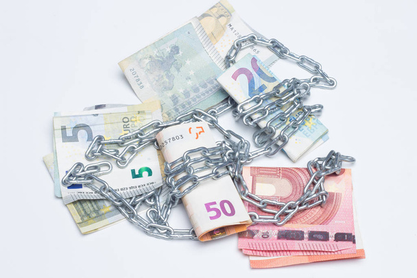 Chained to money - Photo, Image