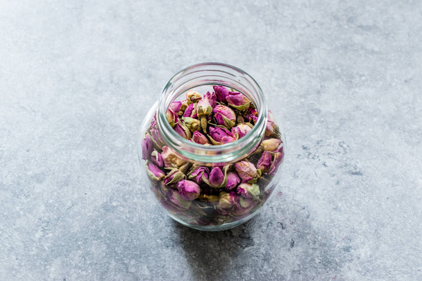 Dried Pink Rose Bud in Glass Jar - Photo, Image