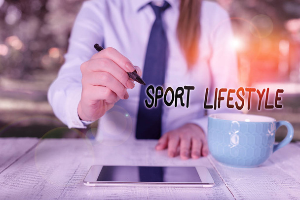 Word writing text Sport Lifestyle. Business concept for athletic lifestyle to get healthy and full of happiness Business woman sitting by the table with cup of coffee and mobile phone. - Photo, Image