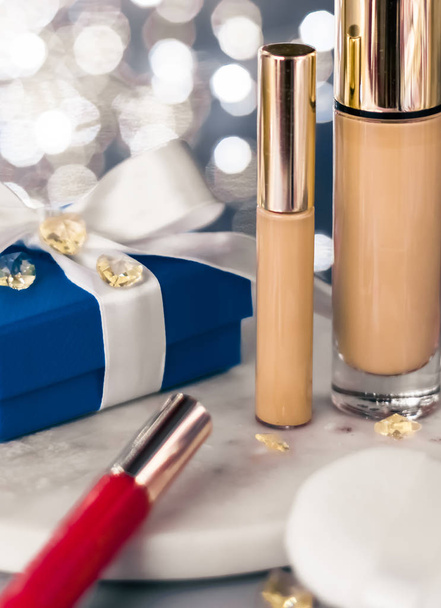 Holiday make-up foundation base, concealer and blue gift box, lu - Photo, Image