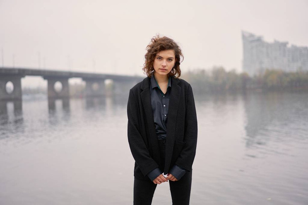      beautiful young woman posing outdoors                           - Valokuva, kuva