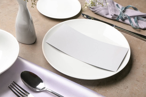 Beautiful table setting on grey background - Foto, imagen