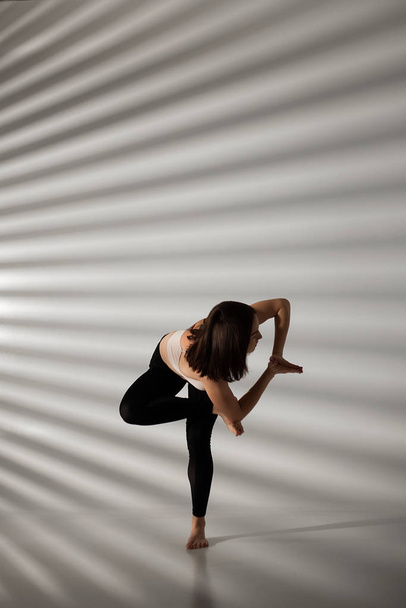 Young girl doing yoga, girl doing yoga exercises - Φωτογραφία, εικόνα