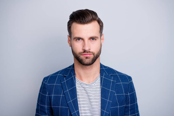 Close-up portrait of his he nice well-groomed serious attractive calm bearded guy wearing checked blazer isolated over light grey pastel color background - Photo, image