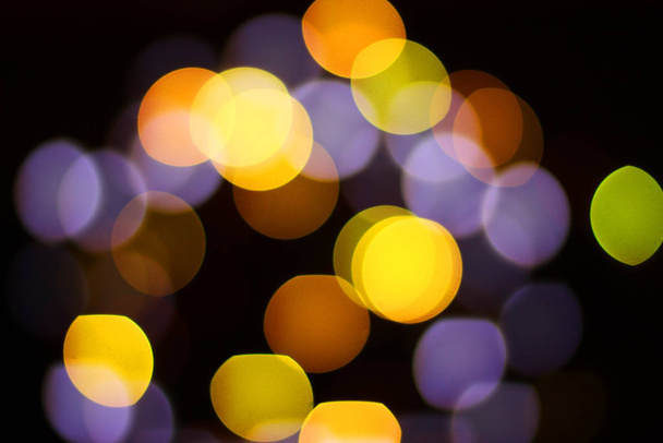 Christmas and happy new year on a blurred bokeh. Glare blurred blank background. - Photo, image