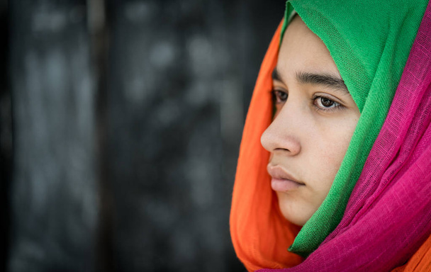 Beautiful girl with colorful scarf portrait - Фото, зображення
