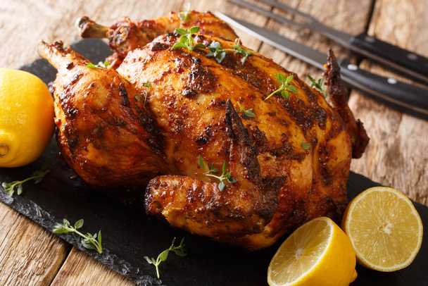 Freshly cooked rotisserie chicken with ginger and spices close-u - Photo, Image