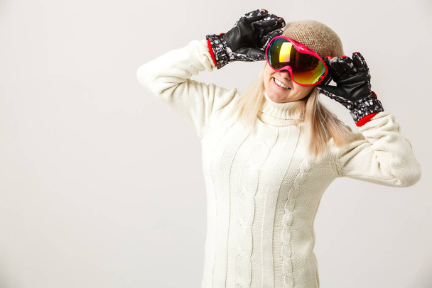 Portrait of a happy young girl wearing ski glasses  - Фото, изображение