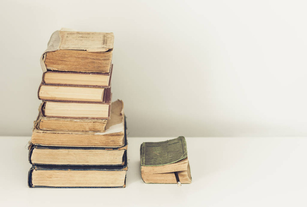 Stack of old books education retro concept background, many book - Photo, image