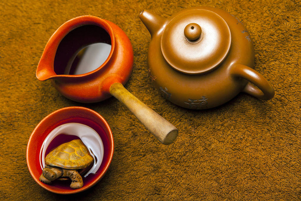 black tea cup plush background  - Foto, afbeelding