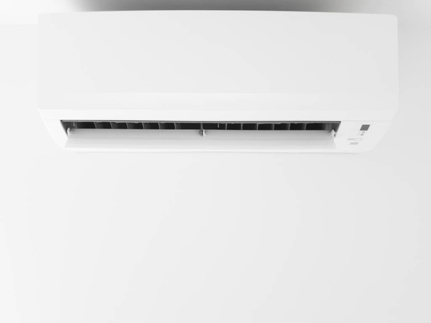 Сучасний кондиціонер на білій стіні всередині вітальні
 - Фото, зображення