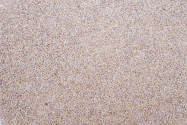 Pearl barley groats background. Top view, copy space - Valokuva, kuva