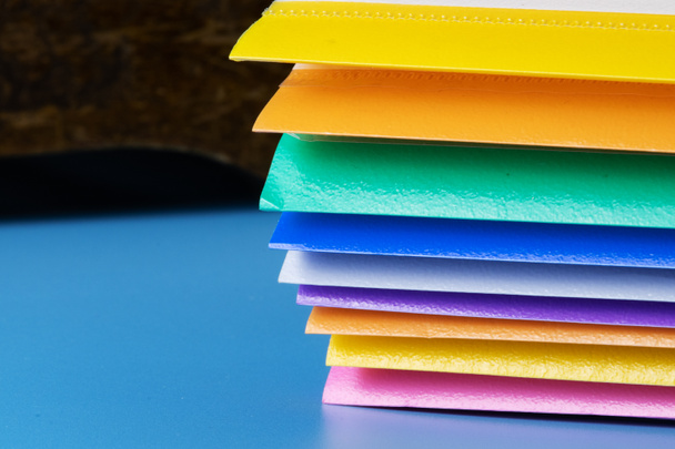 A stack of paper folders on the table. - Photo, Image